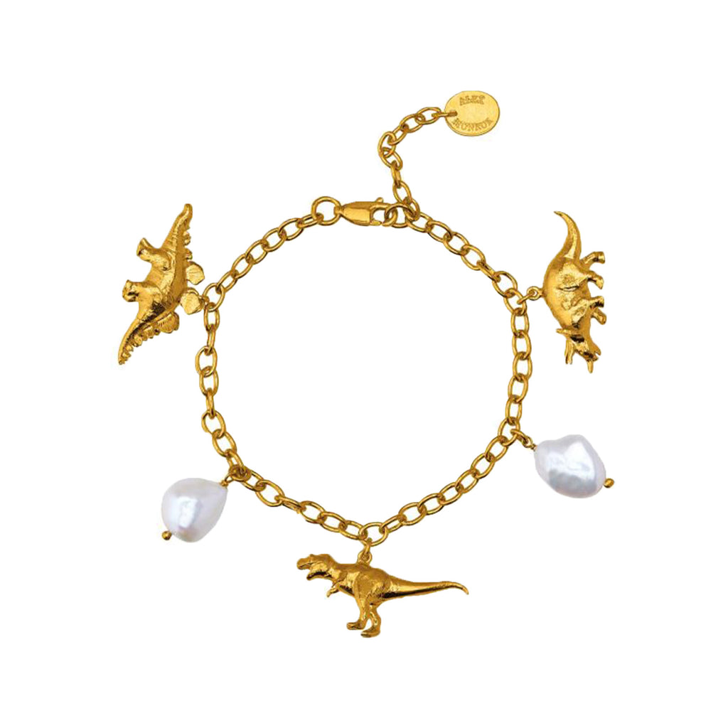 The dinosaur and broque Pearl charm bracelet in gold and pearl colours from the brand ALEX MONROE