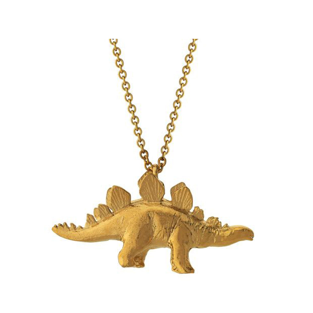 The stegosaurus necklace in gold colour from the brand ALEX MONROE