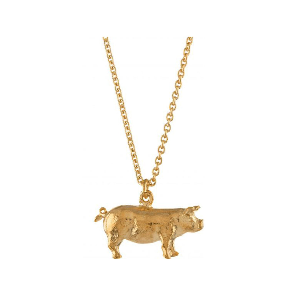 The Suffolk Pig necklace in gold colour from the brand ALEX MONROE