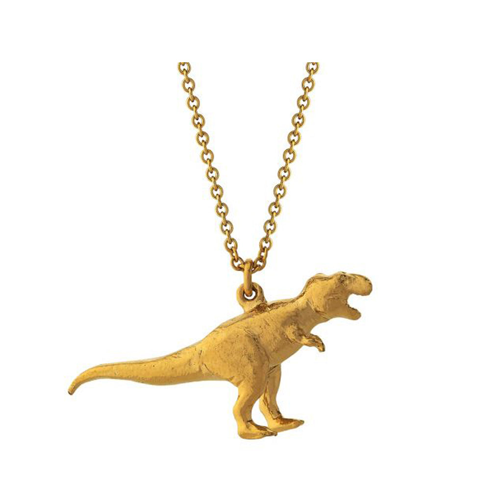 The tyrannosaurus rex necklace in gold colour from the brand ALEX MONROE