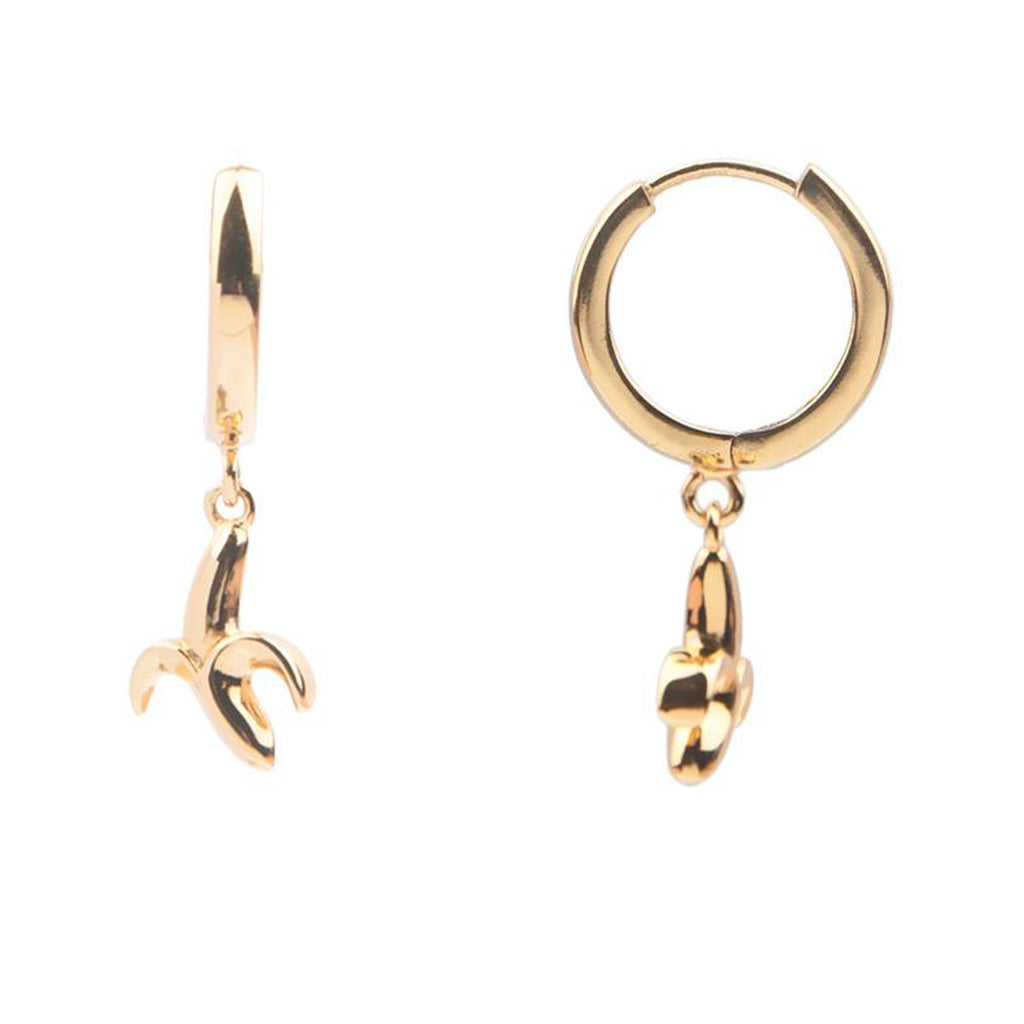 The banana earrings in gold colour from the brand ALL THE LUCK IN THE WORLD