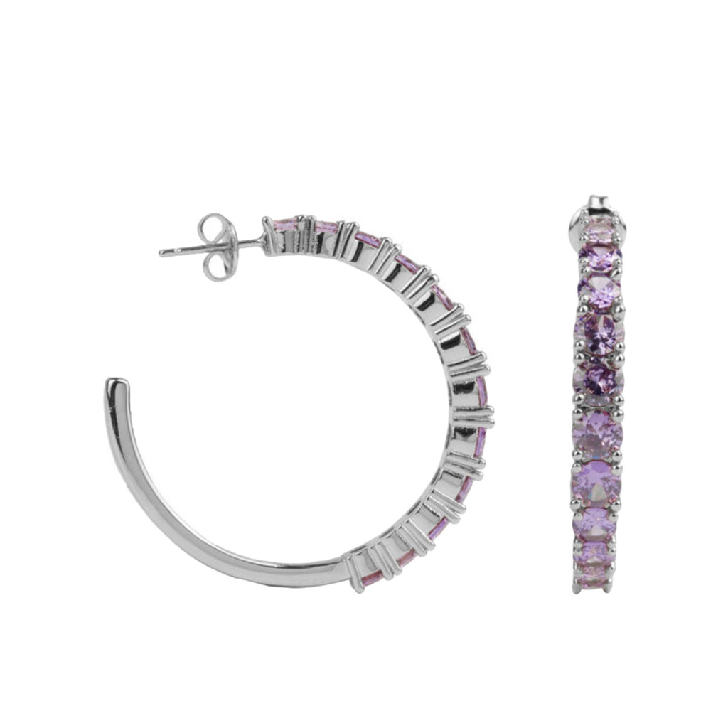 The big gem hoop earrings in silver and purple colour from the brand ALL THE LUCK IN THE WORLD