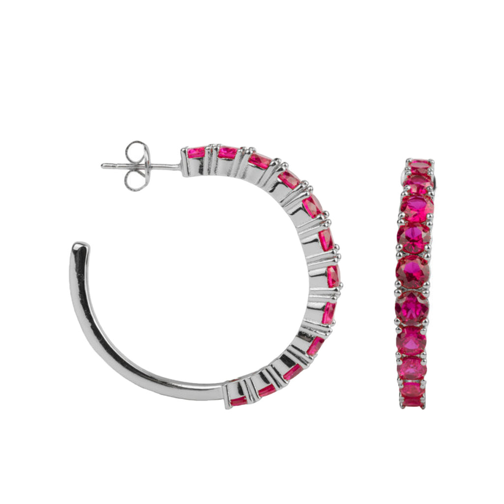 The big gem hoop earrings in silver and rose colour from the brand ALL THE LUCK IN THE WORLD