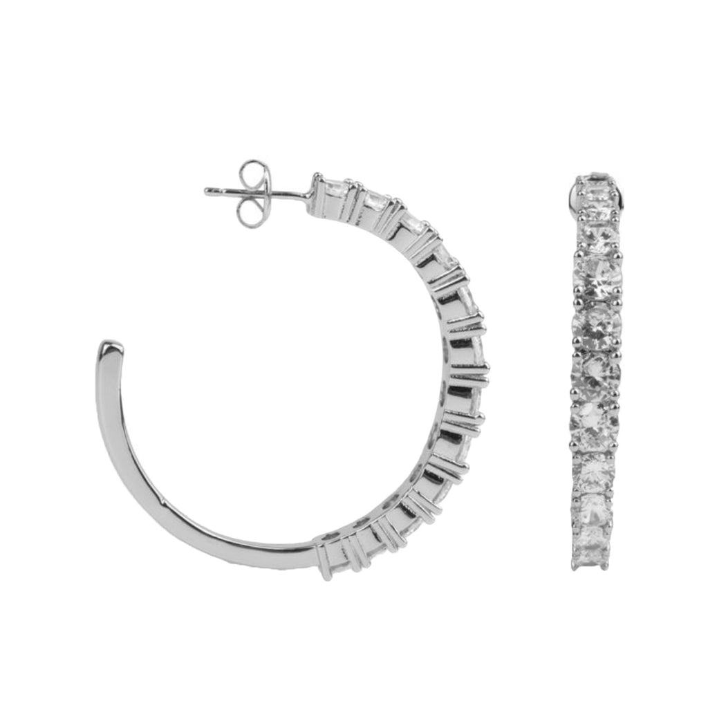 The big gem hoop earrings in silver and white colour from the brand ALL THE LUCK IN THE WORLD