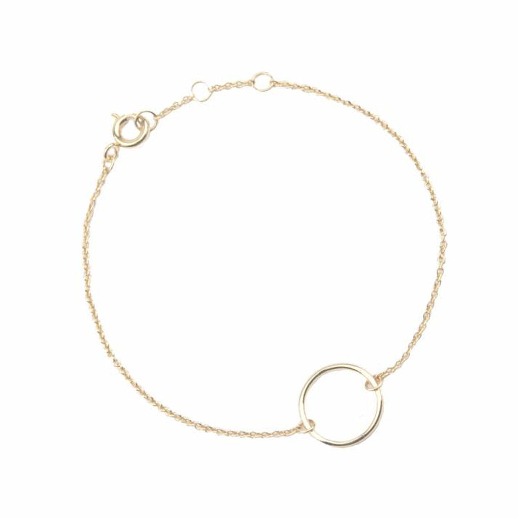 The circle bracelet in gold colour from the brand ALL THE LUCK IN THE WORLD