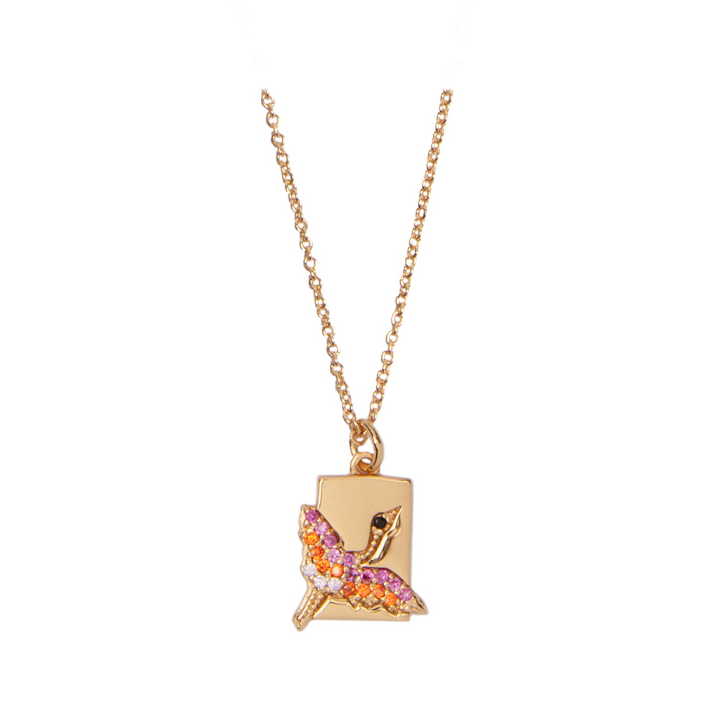 The crane rectangle necklace in gold, purple and orange colour from the brand ALL THE LUCK IN THE WORLD