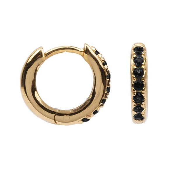 The creole earrings in gold and black colour from the brand ALL THE LUCK IN THE WORLD