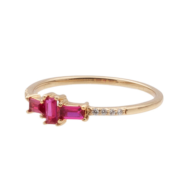 The cross ring in pink and gold colours from the brand ALL THE LUCK IN THE WORLD