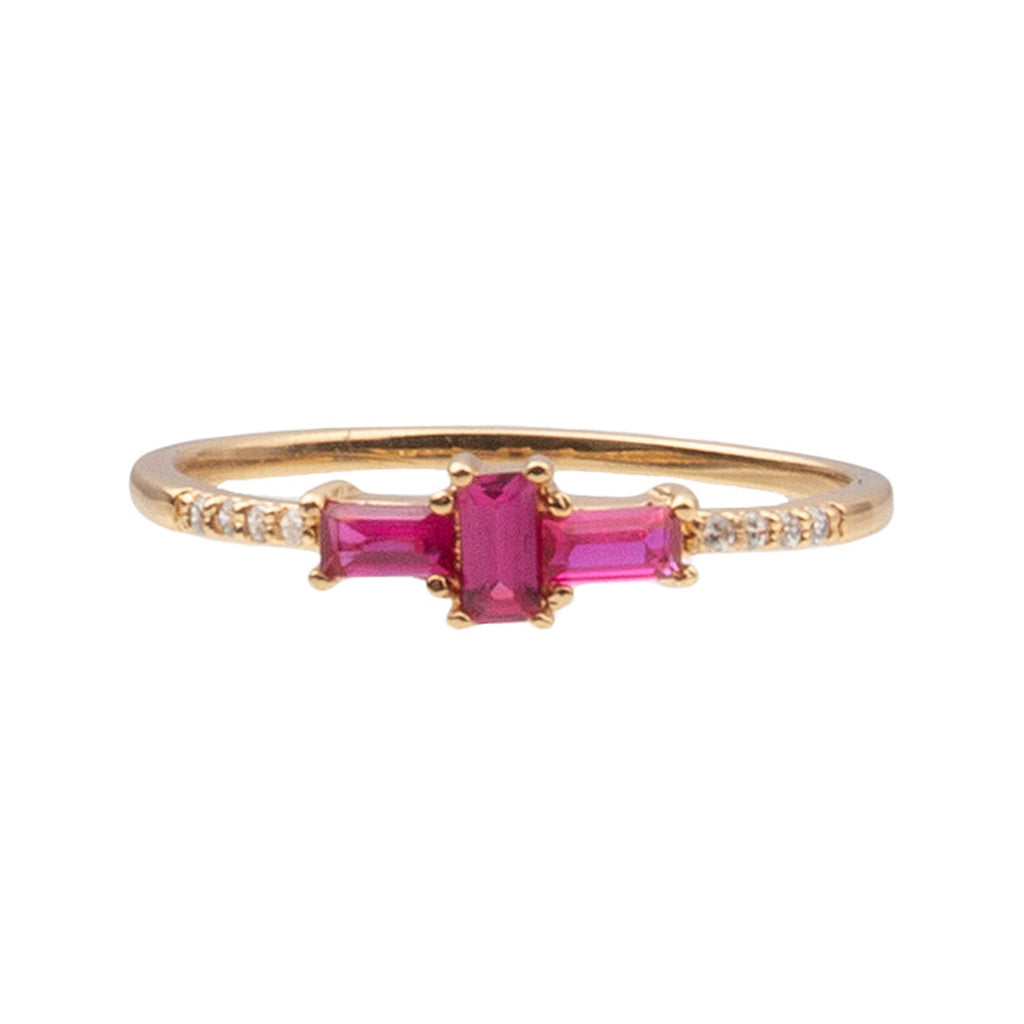 The cross ring in pink and gold colours from the brand ALL THE LUCK IN THE WORLD