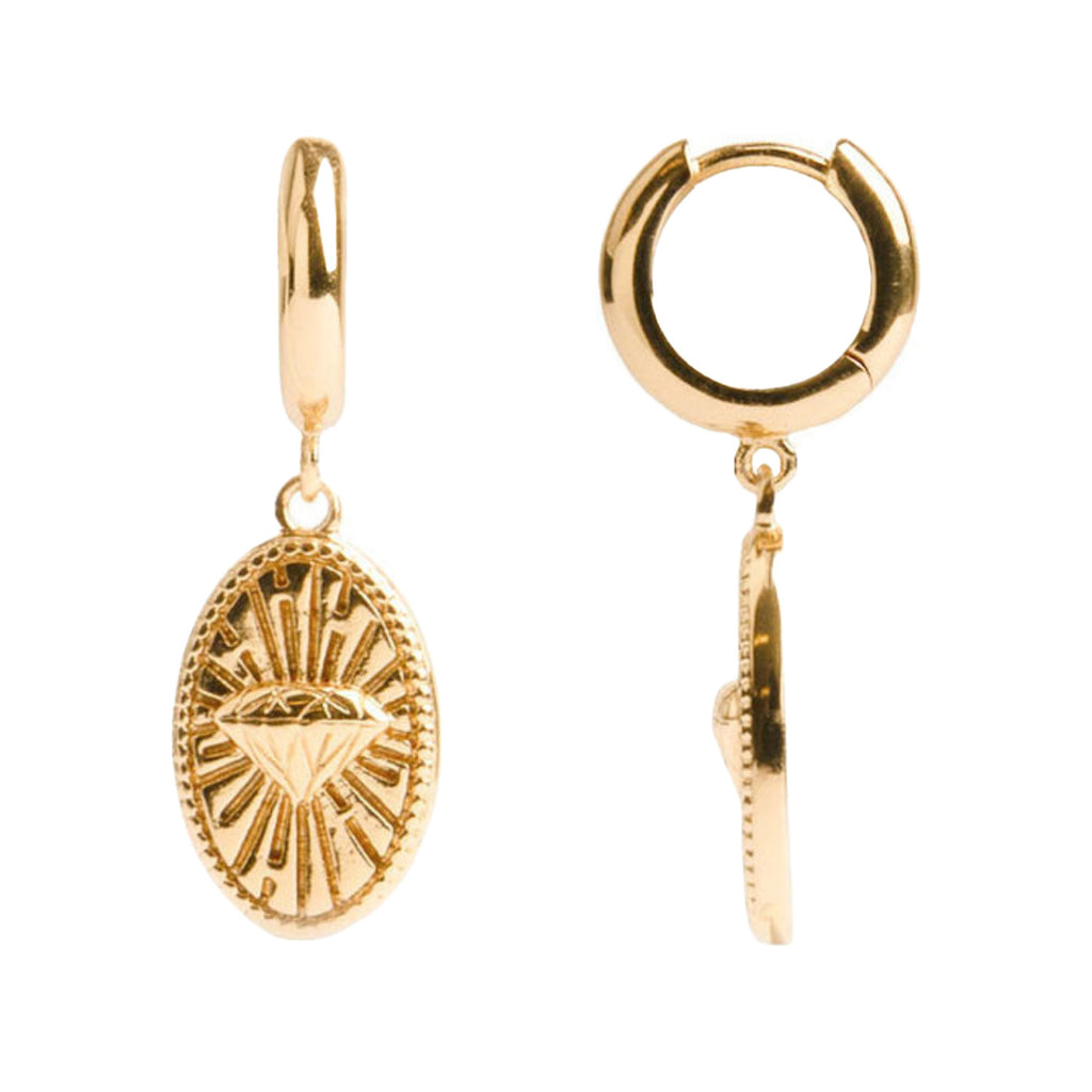 The diamond oval earrings in gold colour from the brand ALL THE LUCK IN THE WORLD