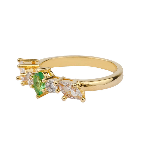 The diamond ring in gold, green and clear colour from the brand ALL THE LUCK IN THE WORLD