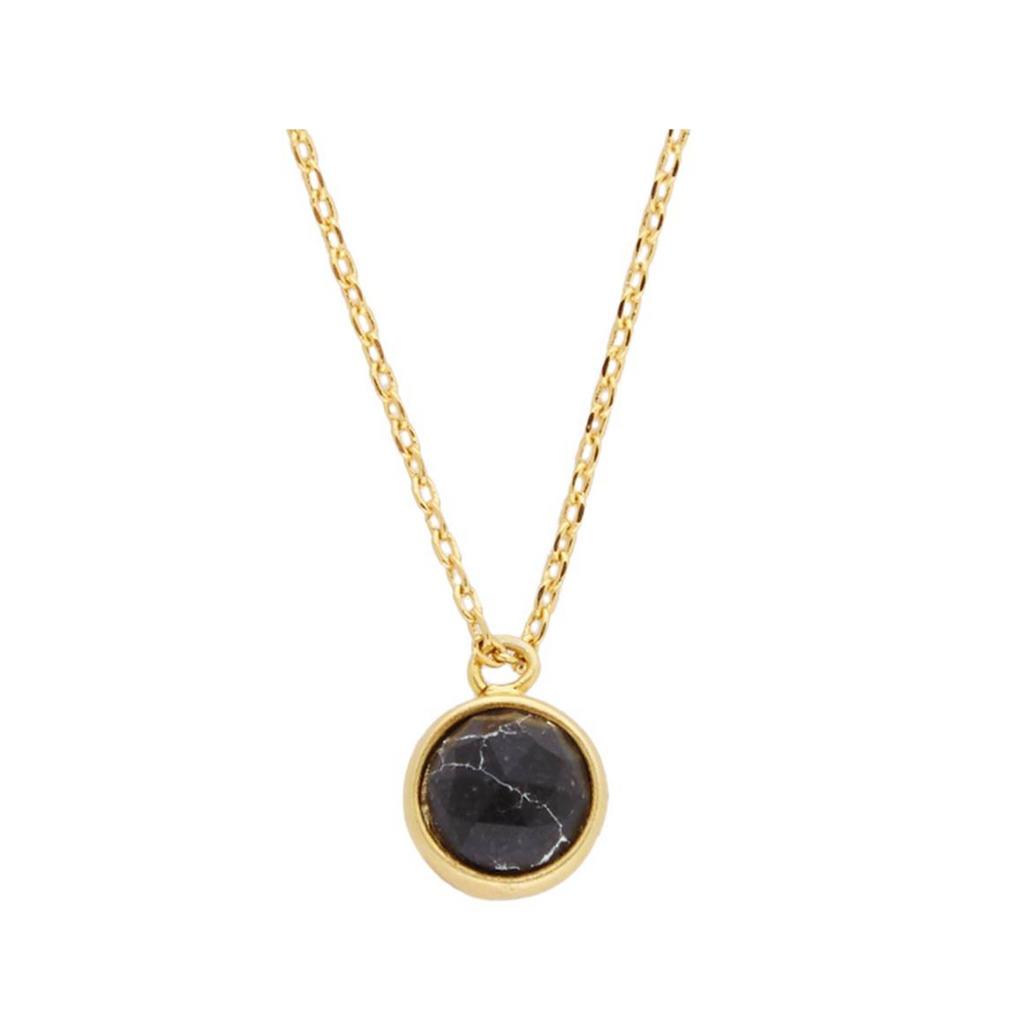 The globe howlite necklace in gold and black colour from the brand ALL THE LUCK IN THE WORLD