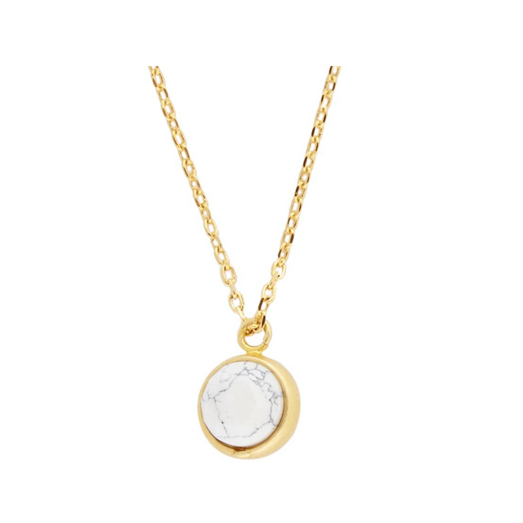 The globe howlite necklace in gold and white colour from the brand ALL THE LUCK IN THE WORLD