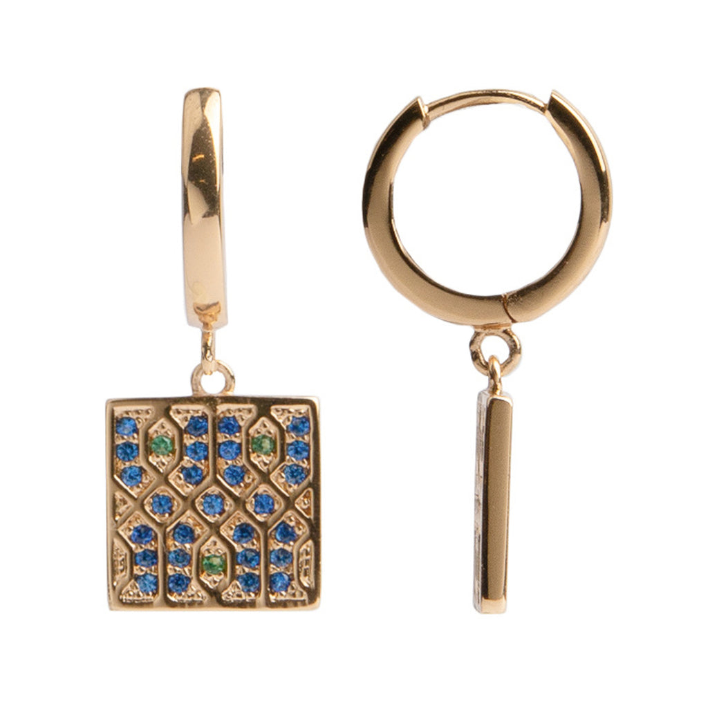 The graphic square earrings in gold, blue and green colour from the brand ALL THE LUCK IN THE WORLD