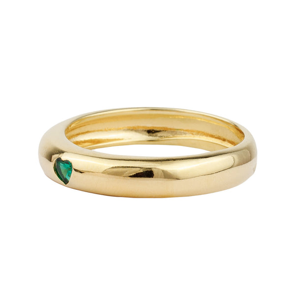 The heart ring in gold and green colours from the brand ALL THE LUCK IN THE WORLD