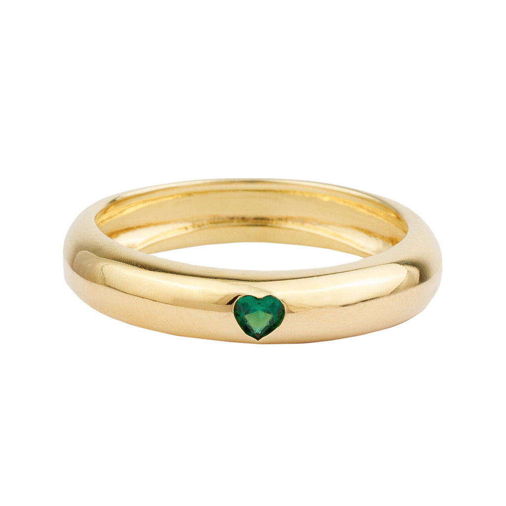 The heart ring in gold and green colours from the brand ALL THE LUCK IN THE WORLD