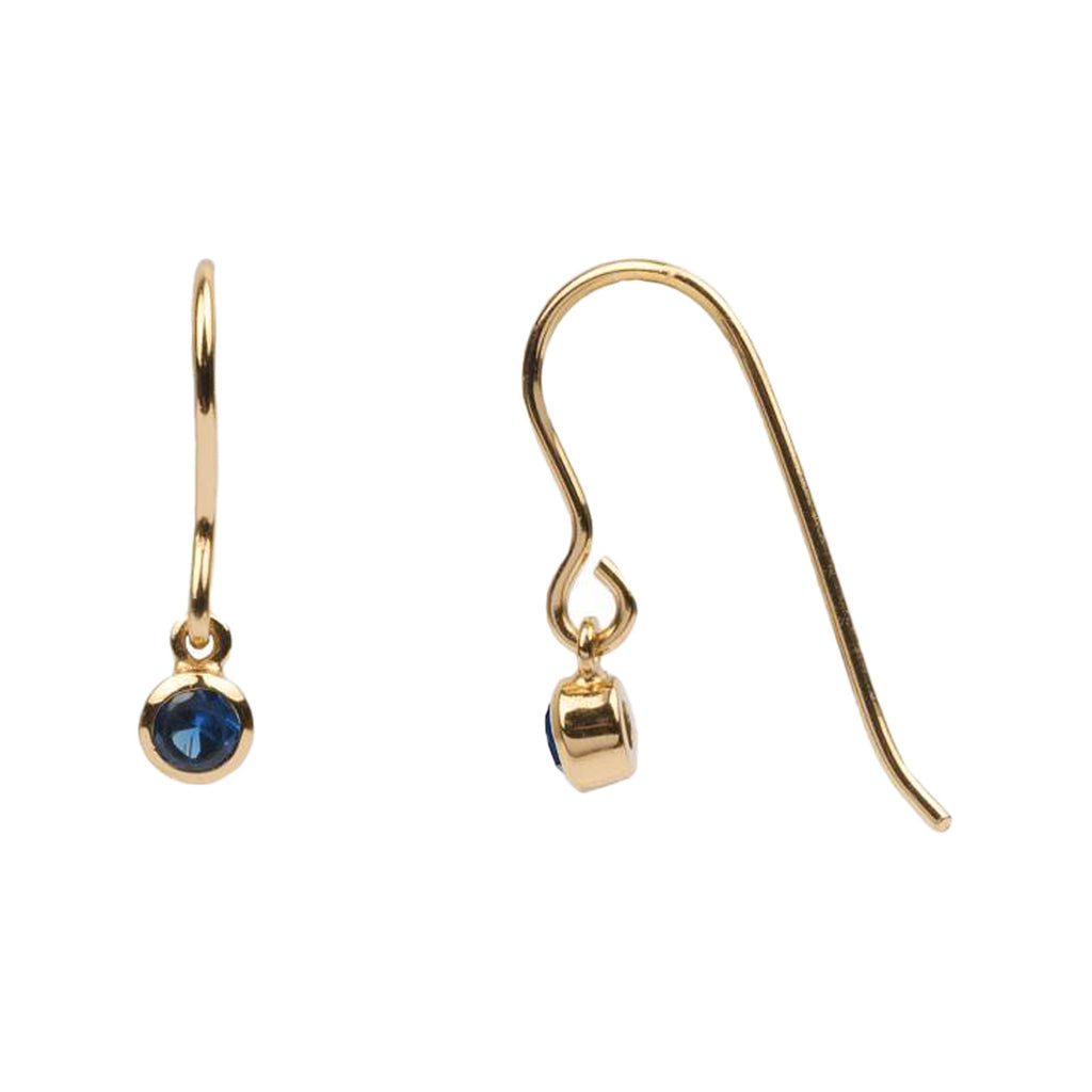 The hook sapphire earrings in gold and blue colours from the brand ALL THE LUCK IN THE WORLD.