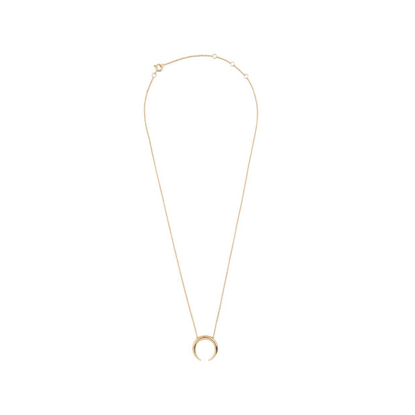 The horn necklace in gold colour from the brand ALL THE LUCK IN THE WORLD