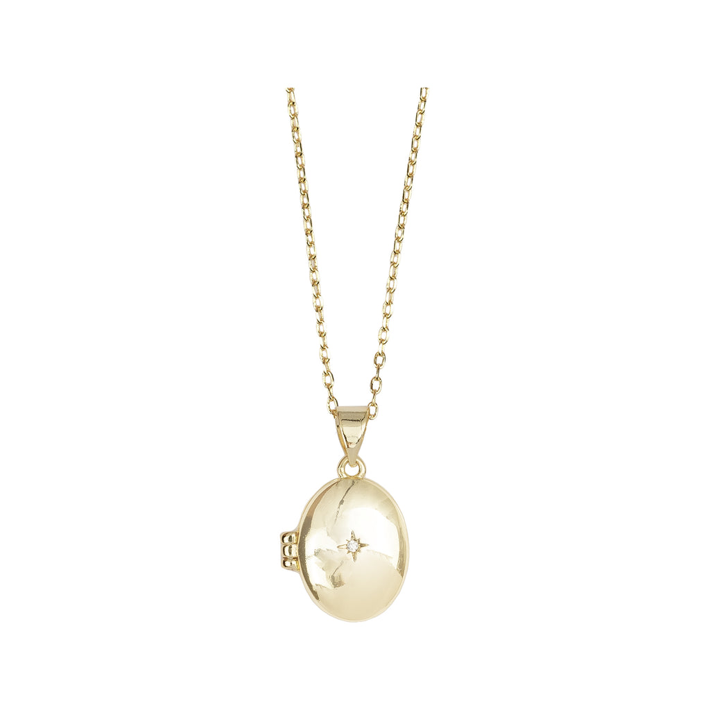 The medaillon north star necklace in gold and clear color from the brand ALL THE LUCK IN THE WORLD