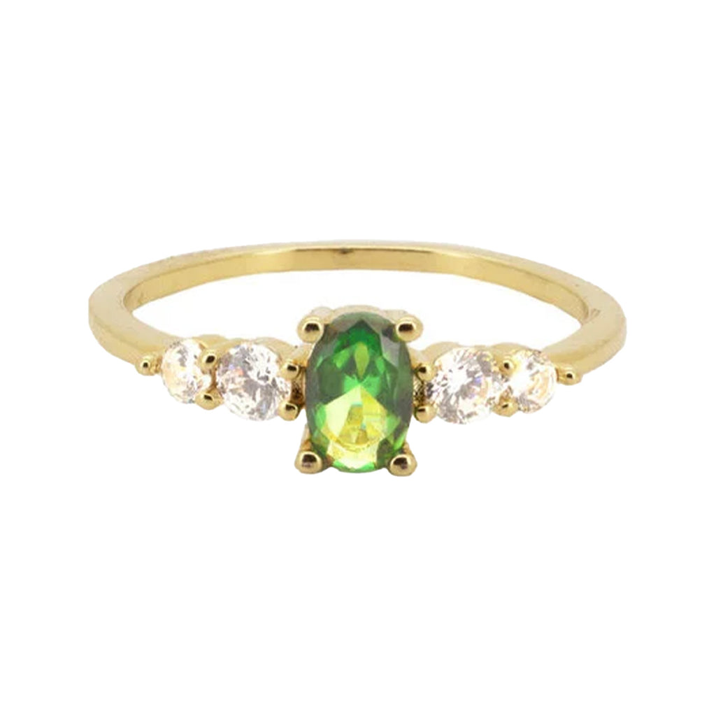 The Oval ring in gold and green colours from the brand ALL THE LUCK IN THE WORLD.