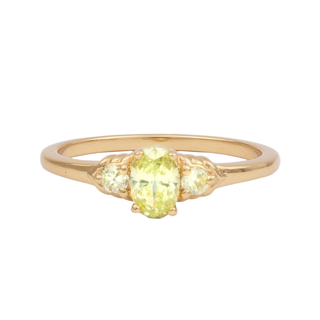 The Oval small ring in gold and lime colours from the brand ALL THE LUCK IN THE WORLD.