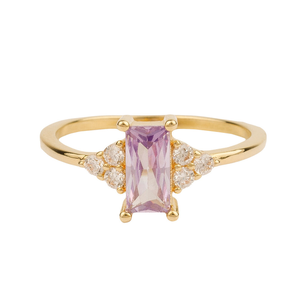 The rectangle ring in gold, purple and clear colour from the brand ALL THE LUCK IN THE WORLD