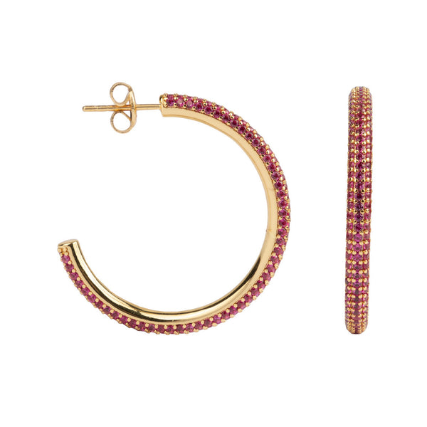 The round hoop earrings in gold and rose colour from the brand ALL THE LUCK IN THE WORLD