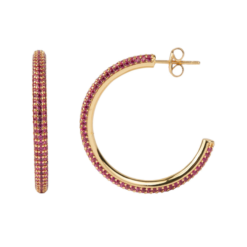 The round hoop earrings in gold and rose colour from the brand ALL THE LUCK IN THE WORLD