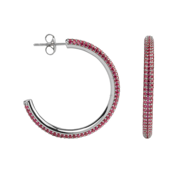 The round hoop earrings in silver and rose colour from the brand ALL THE LUCK IN THE WORLD