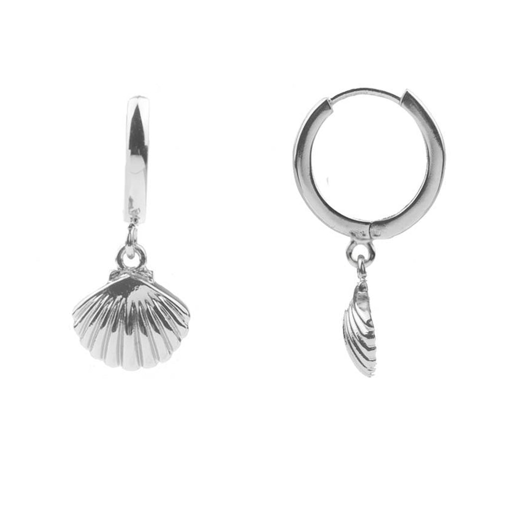 The sea shell earrings in silver colour from the brand ALL THE LUCK IN THE WORLD