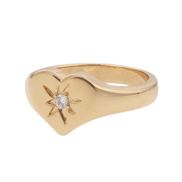 The signet heart ring in gold and clear colour from the brand ALL THE LUCK IN THE WORLD