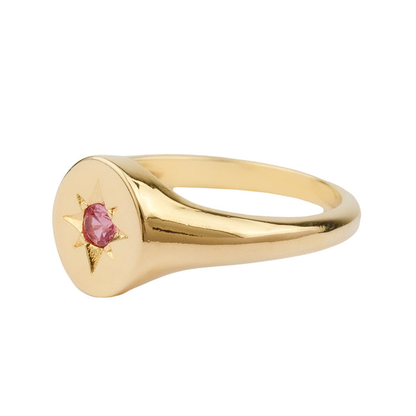 The signet star ring in gold and pink colour from the brand ALL THE LUCK IN THE WORLD