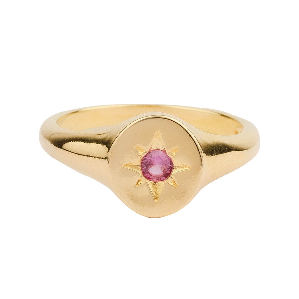 The signet star ring in gold and pink colour from the brand ALL THE LUCK IN THE WORLD