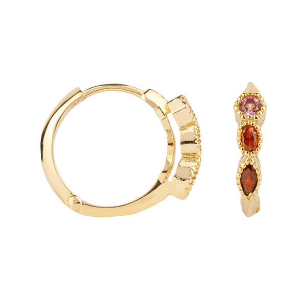 The trio zirconia earrings in gold and red colour from the brand ALL THE LUCK IN THE WORLD