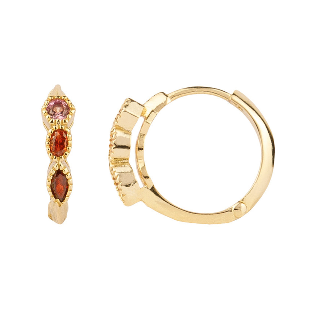 The trio zirconia earrings in gold and red colour from the brand ALL THE LUCK IN THE WORLD