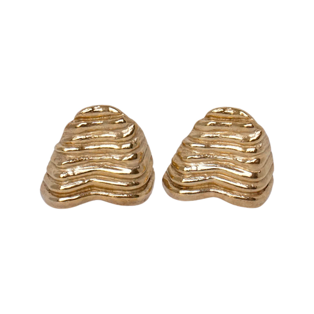 The fluted shell earrings in gold colour from the brand ANITA BERISHA