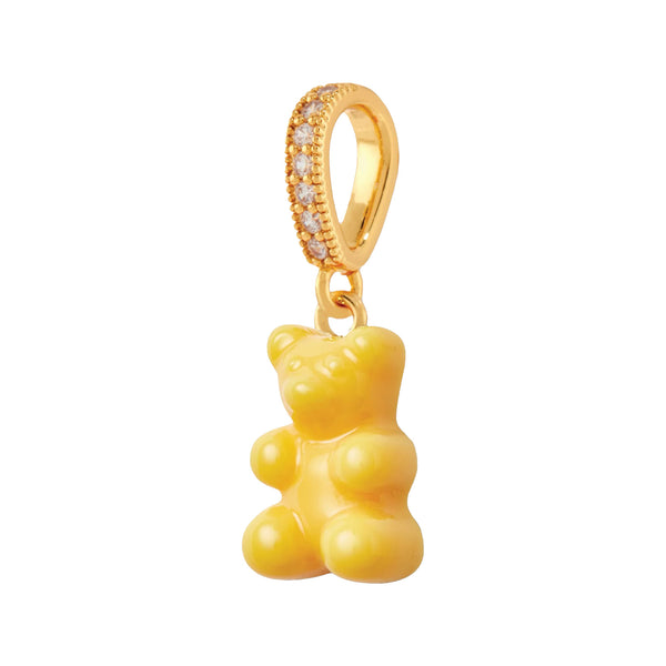 The nostalgia bear pendant with pave connector in taxi yellow and gold colors from the brand CRYSTAL HAZE