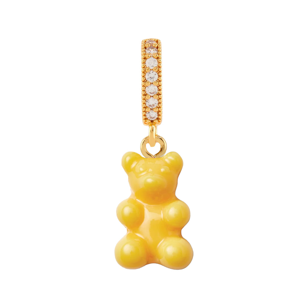 The nostalgia bear pendant with pave connector in taxi yellow and gold colors from the brand CRYSTAL HAZE