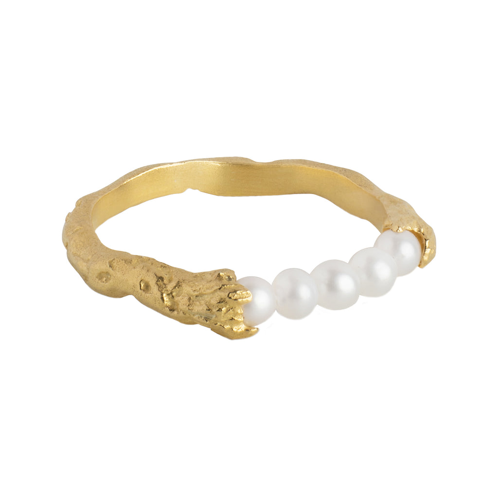 The Ailana ring in gold and pearl colour from the brand ENAMEL COPENHAGEN