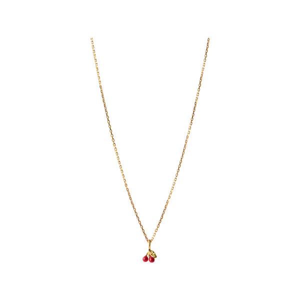 The cherry necklace in gold and red colour from the brand ENAMEL COPENHAGEN