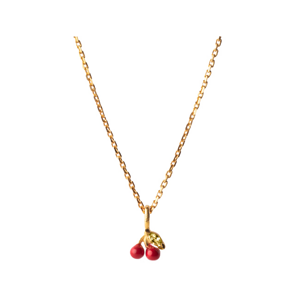 The cherry necklace in gold and red colour from the brand ENAMEL COPENHAGEN