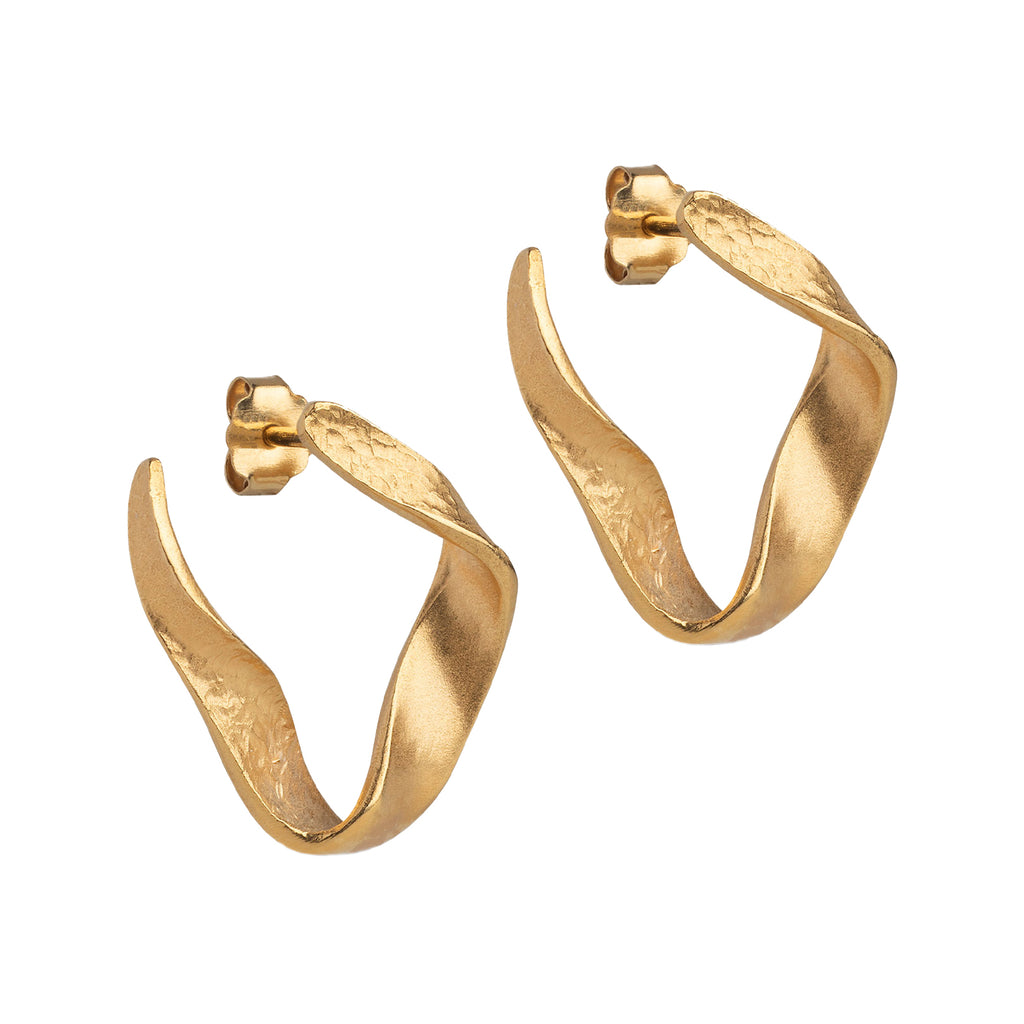 The Dalia earrings in gold colour from the brand ENAMEL COPENHAGEN