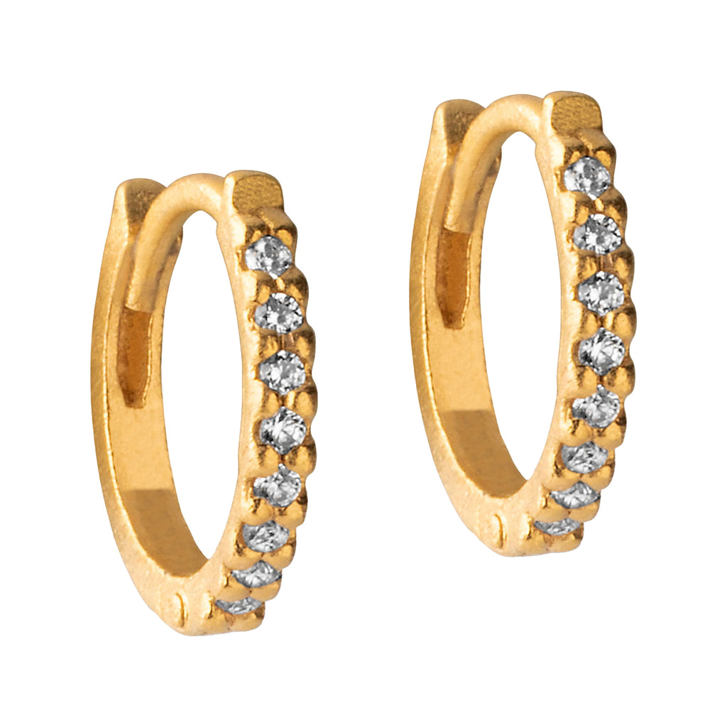 The petite flora hoop earrings in gold colour from the brand ENAMEL COPENHAGEN