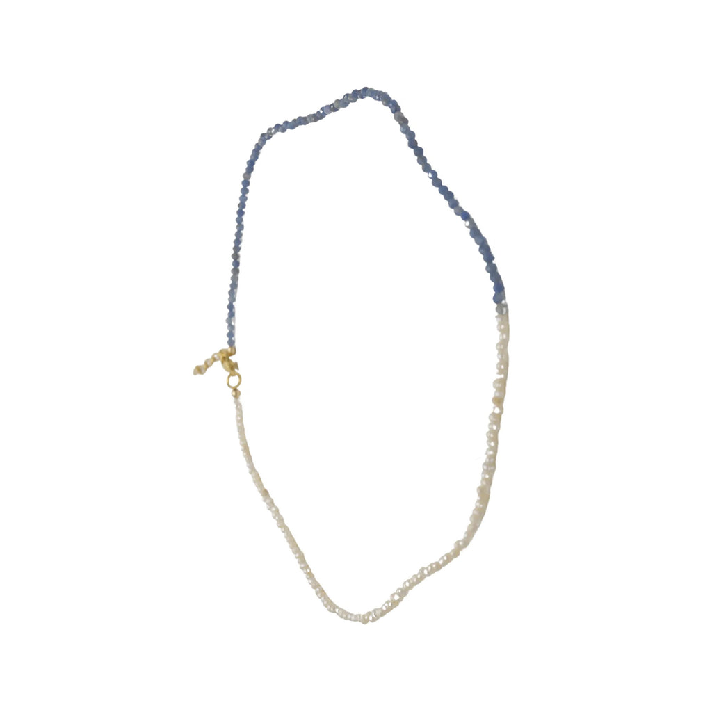 The Emmie bi-material necklace in gold, pearl and blue colour from the brand GISEL B