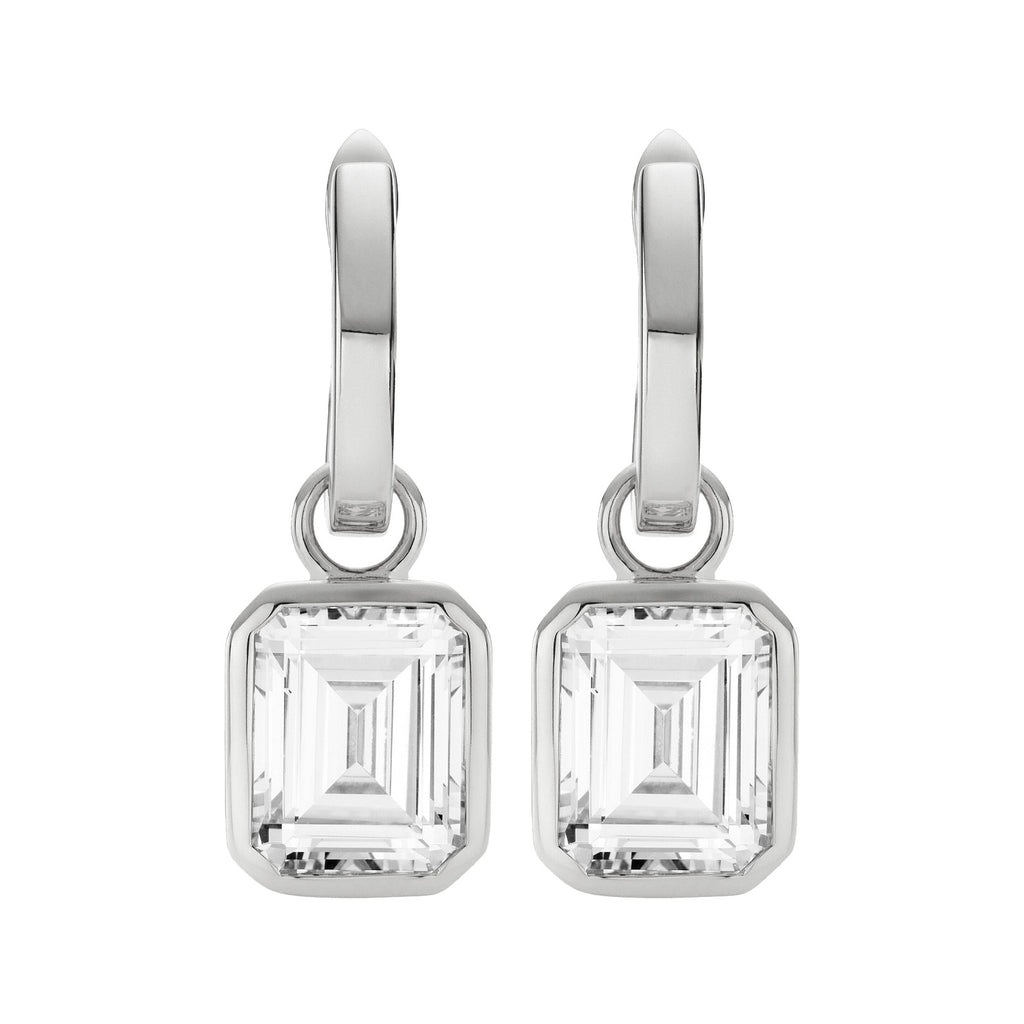 The Emerald Cut drop earrings in silver and clear colours from the brand HEAVENLY LONDON