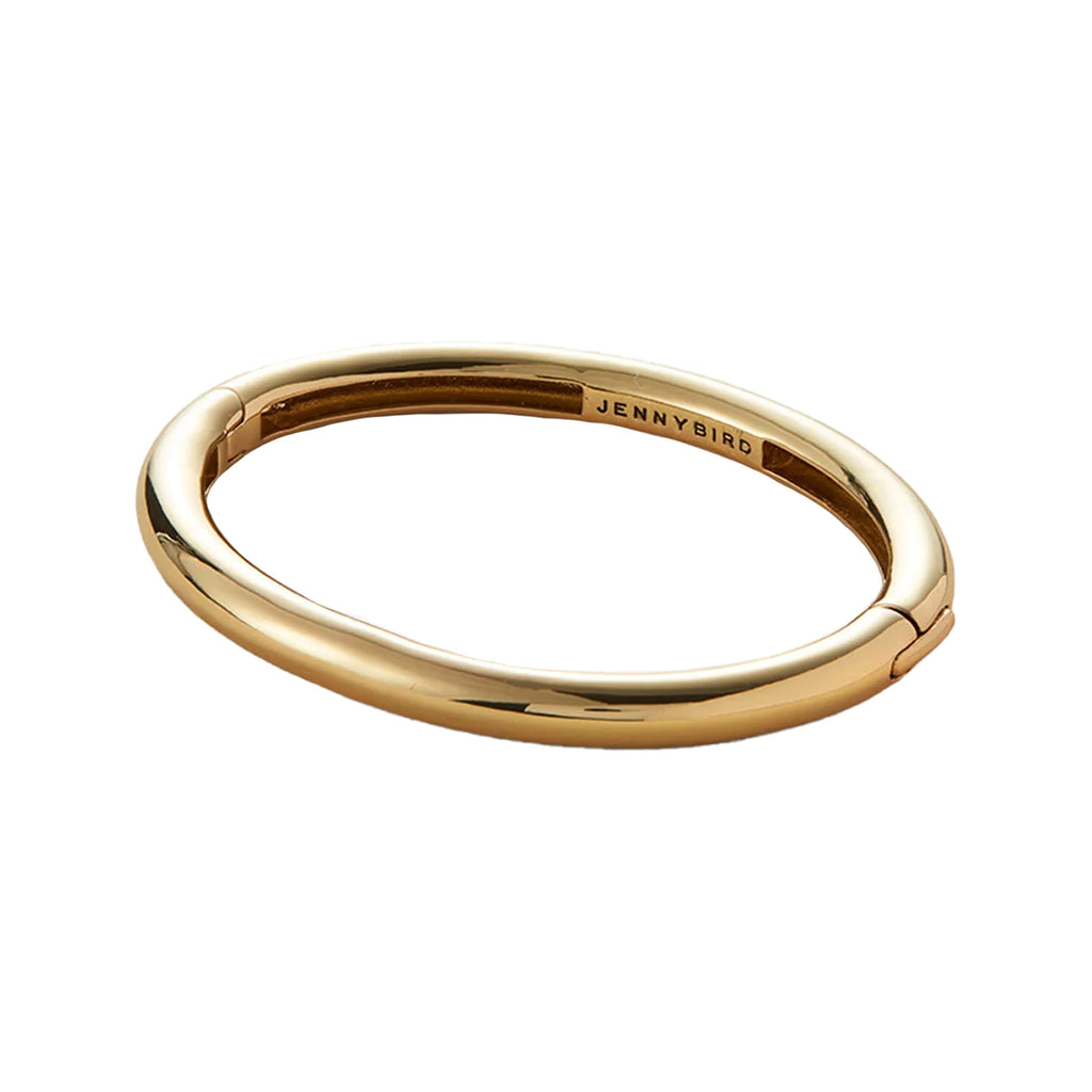 The Gia bangle bracelet in gold colour from the brand JENNY BIRD