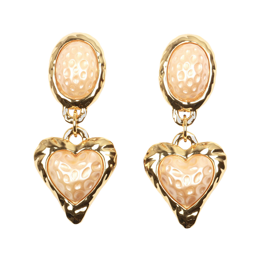 The Night Fever earrings in gold and pearl colours from the brand JULIETTA