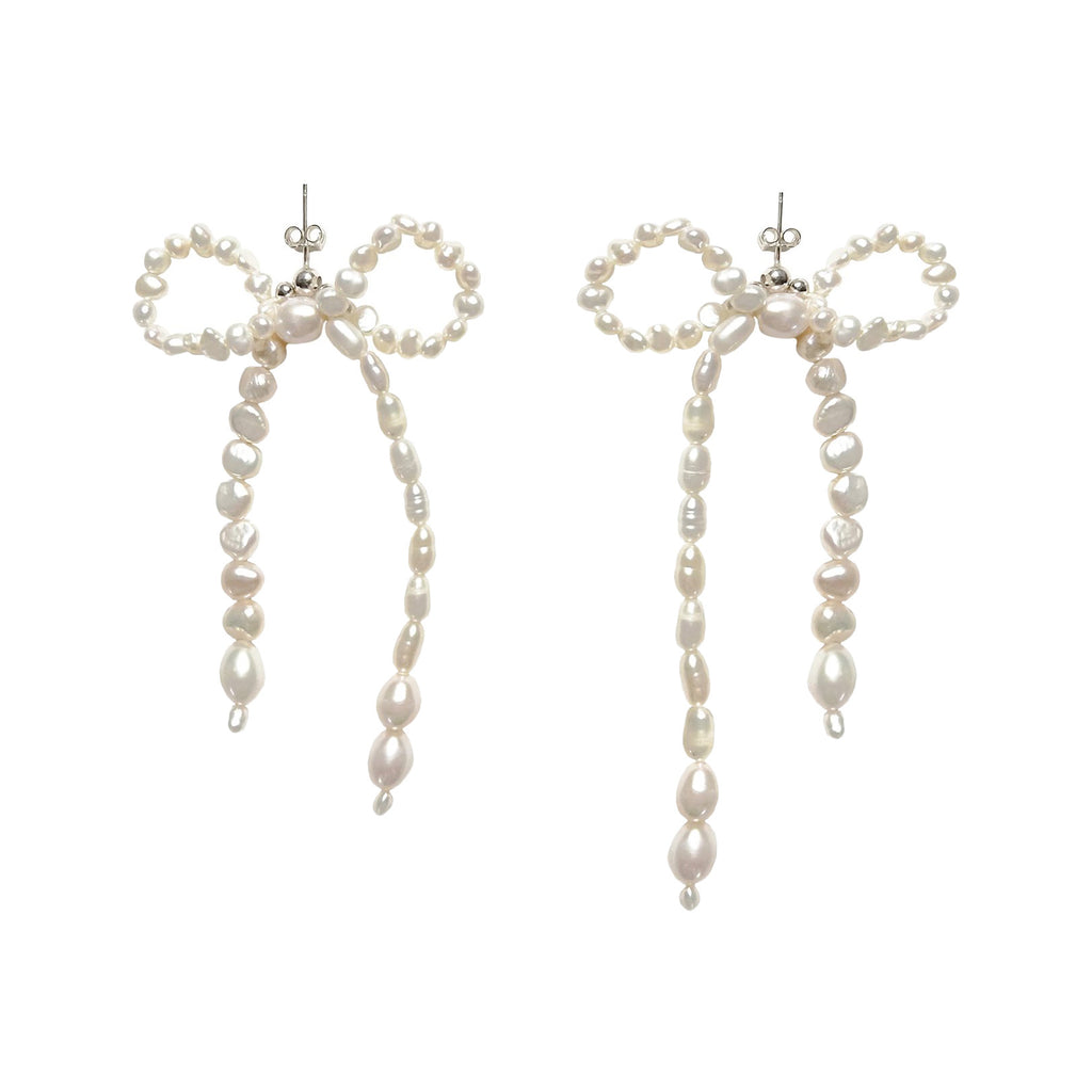 The Dreams Unwind Stud earrings in silver and pearl colours from the brand MARGAUX STUDIOS