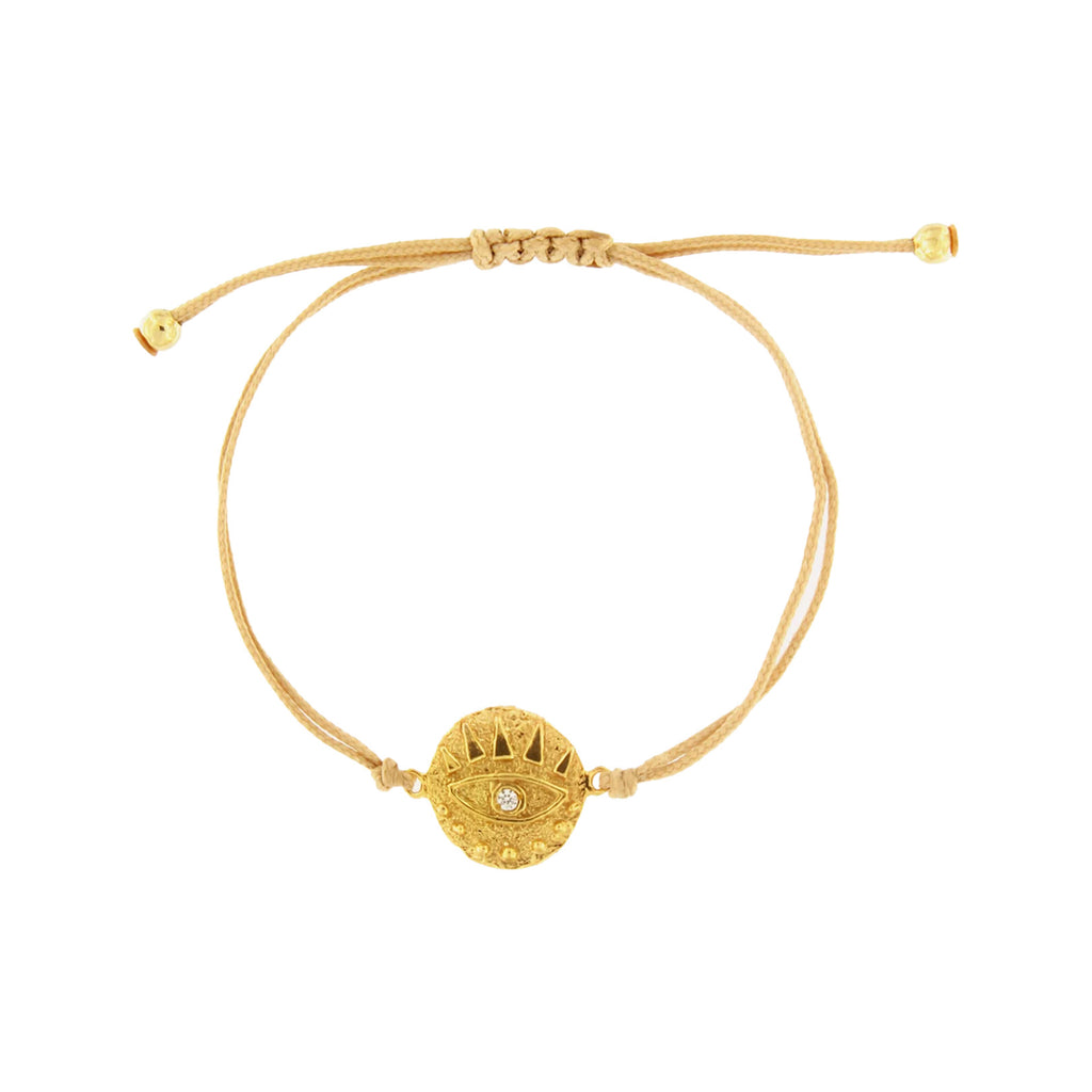 The Round Eye Bracelet in gold and beige colours from the brand MESH