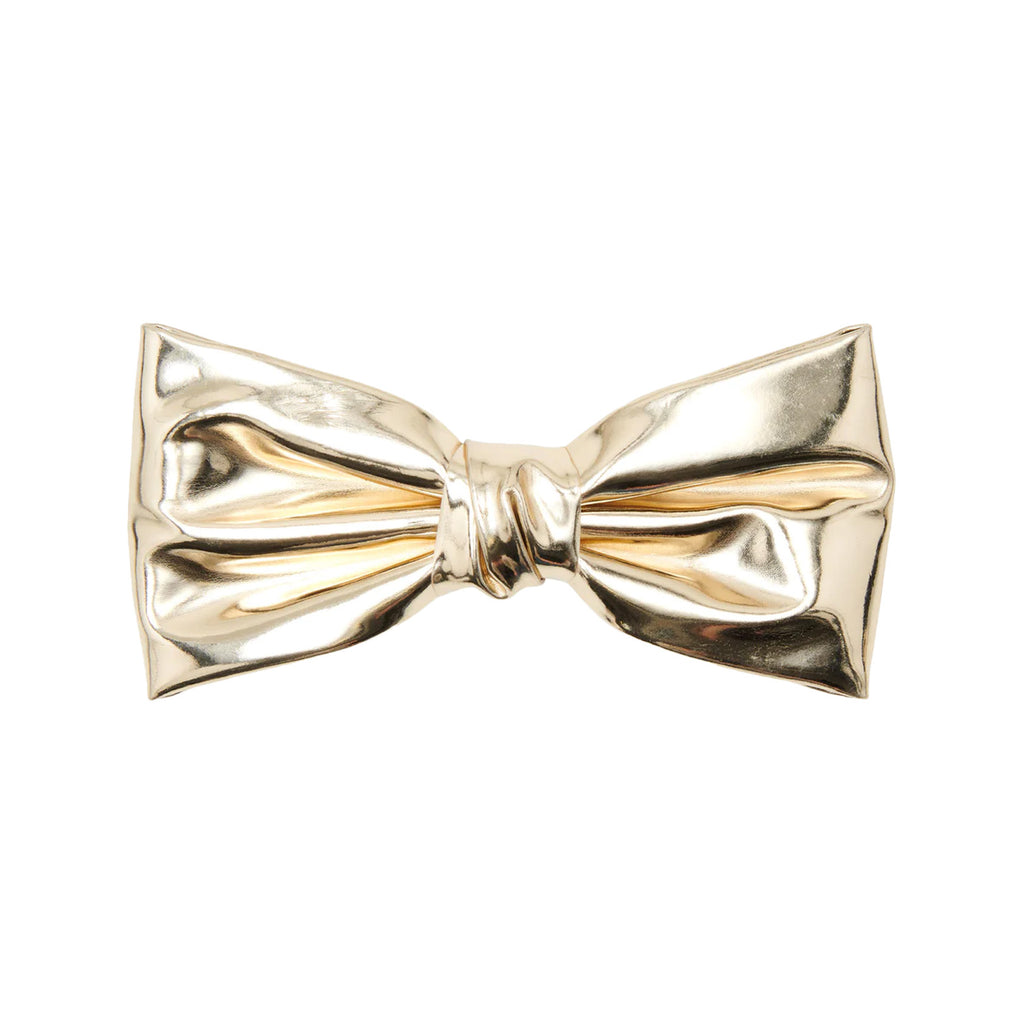 The Kiki bow clip in gold colour from the brand PICO COPENHAGEN